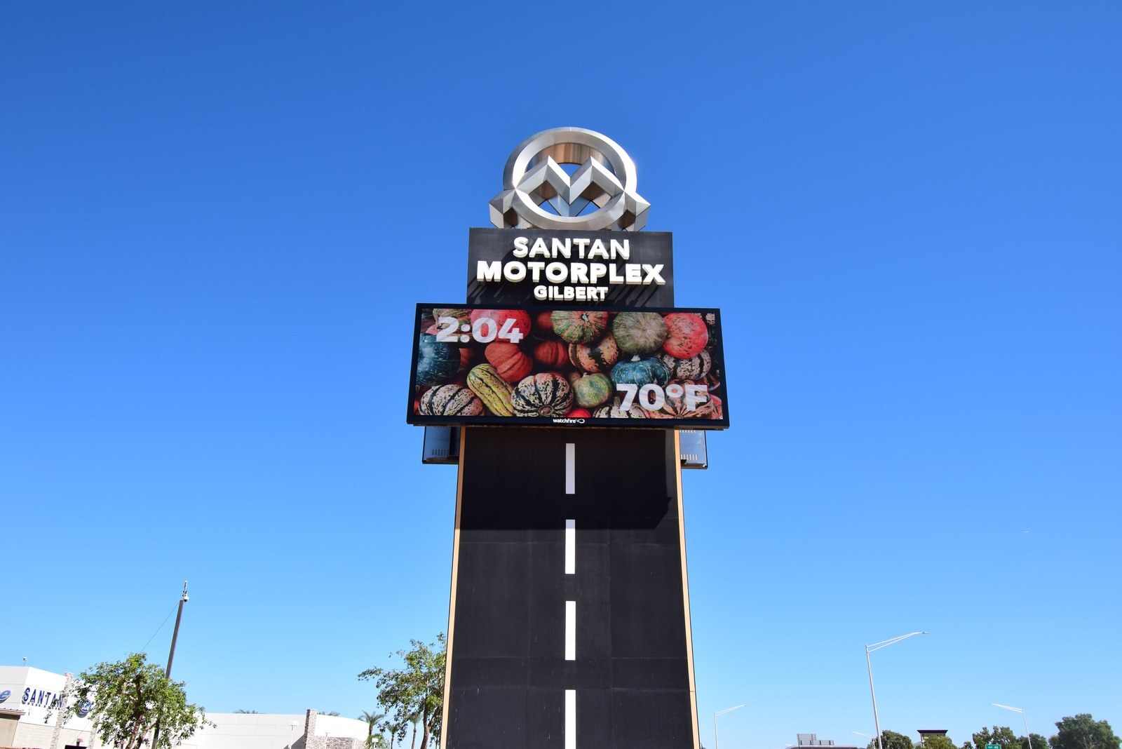 The San Tan Motorplex tower sign in Gilbert, Arizona, with its new full-color LED display under the Motorplex logo